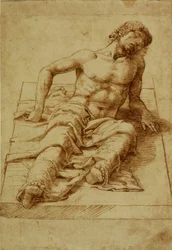 Homme étendu sur une dalle de pierre